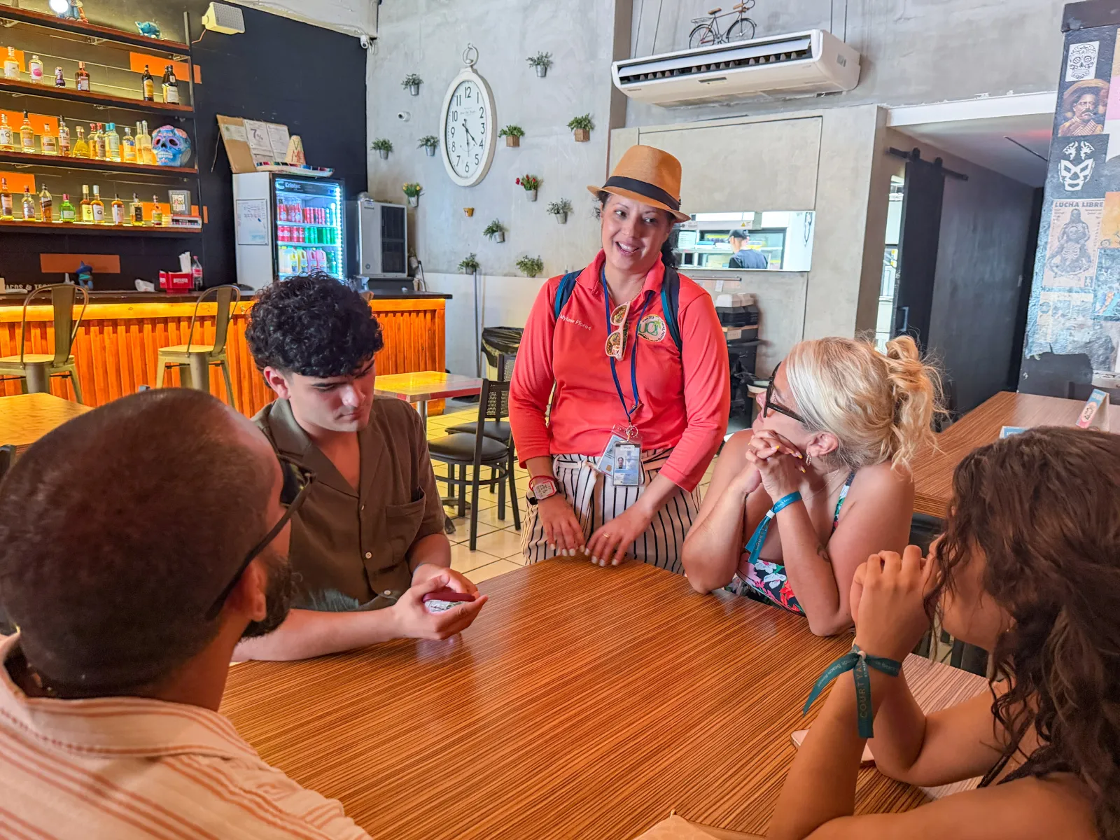 A guide and travelers grabbing a bite between stops.